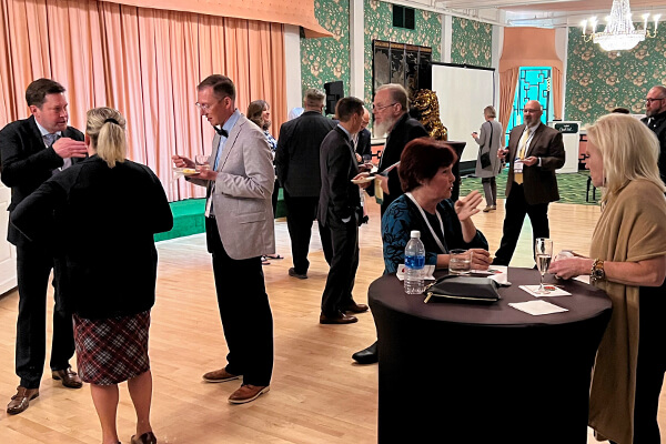 Conference goers mingle at the poster / networking reception.