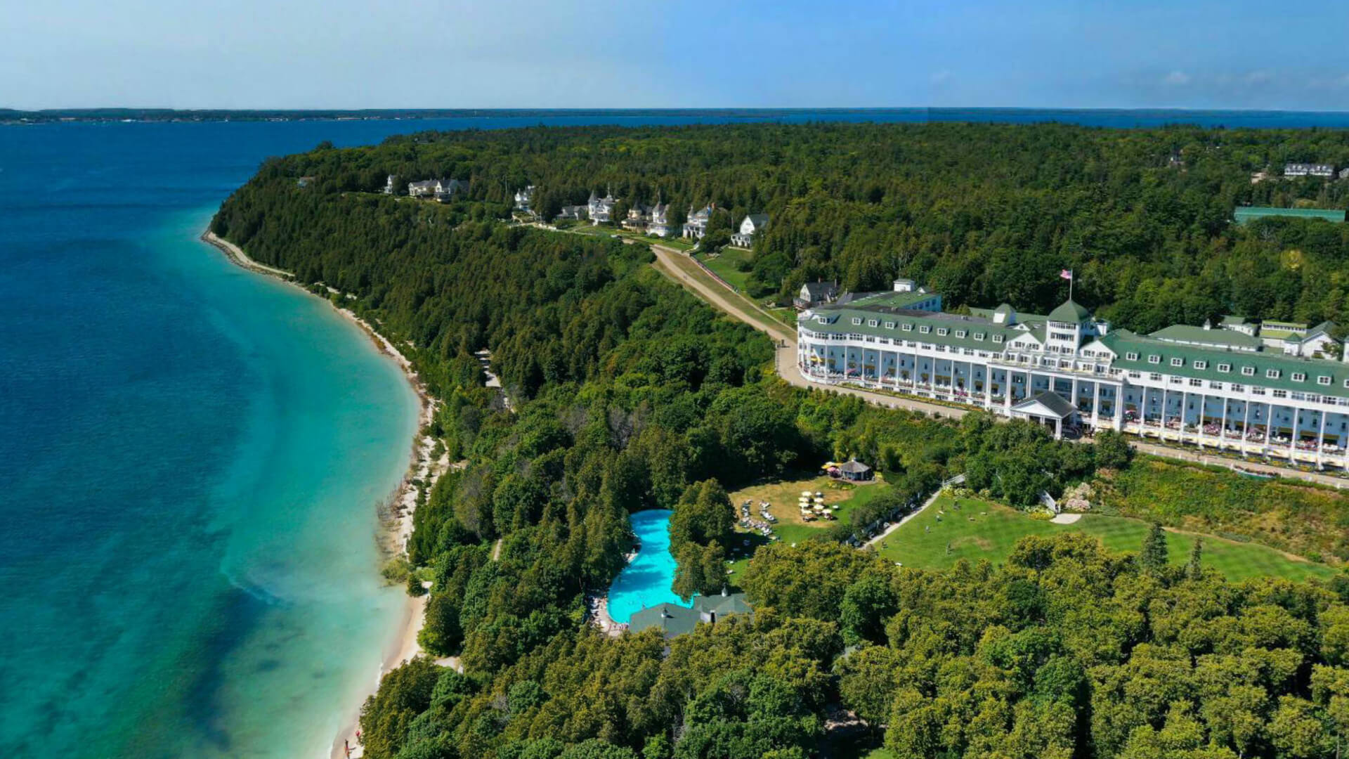 A beautiful aerial shot of the Grand Hotel and Lake Huron.